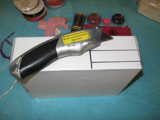 This is a pretty thick box, so I used a box cutter rather than fight it with scissors. This is a pretty thick box, so I used a box cutter rather than fight it with scissors.