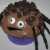 The spider is just four cut Twizzlers on each side for legs and a sliver for the mouth. Eyes are applied and chocolate shavings make it hairy! The spider is just four cut Twizzlers on each side for legs and a sliver for the mouth. Eyes are applied and chocolate shavings make it hairy!