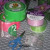 Materials - Scissors, duct tape, ribbon and plastic containers.