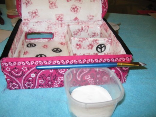 Apply Mod Podge liberally to the inside and outside of the box.  I did three coats.  The smaller brush worked  well for me inside. Apply Mod Podge liberally to the inside and outside of the box.  I did three coats.  The smaller brush worked  well for me inside.