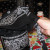 Insert the newly fashioned drawstring into the top fold of the bandanna you just glued down. Insert the newly fashioned drawstring into the top fold of the bandanna you just glued down.