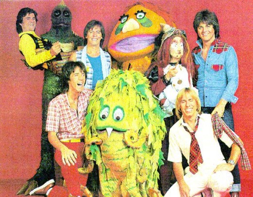 Kroftt Puppets posing with 70s rock band Bay City Rollers