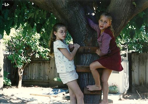 My nieces climbing a tree.