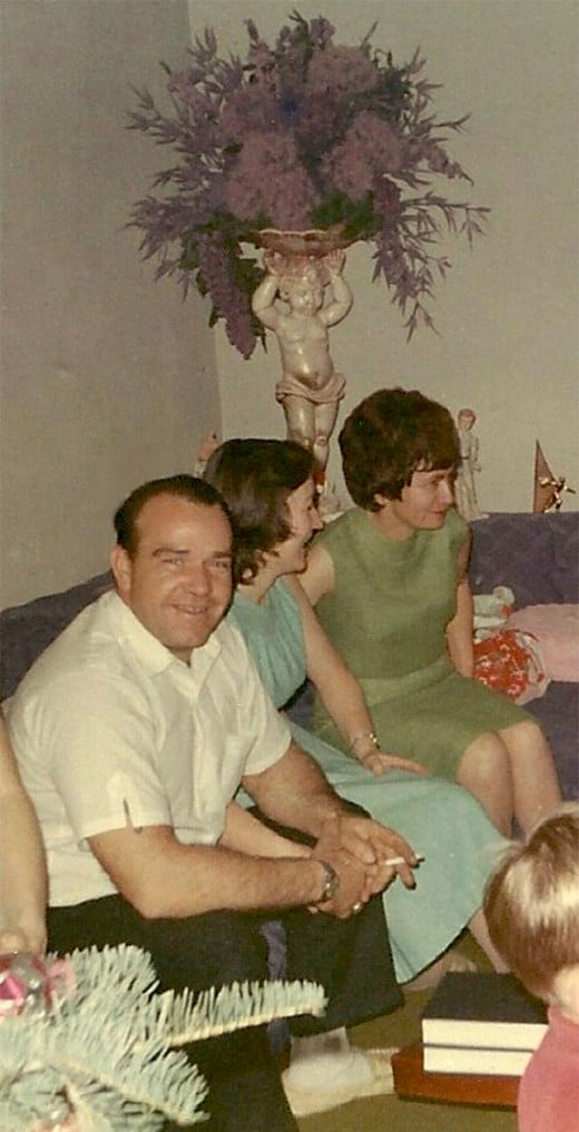 Dad and Mom sitting next to him, Christmas 1967.