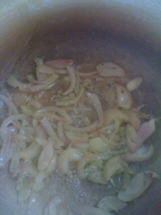 Fry the onions and garlic paste in butter.