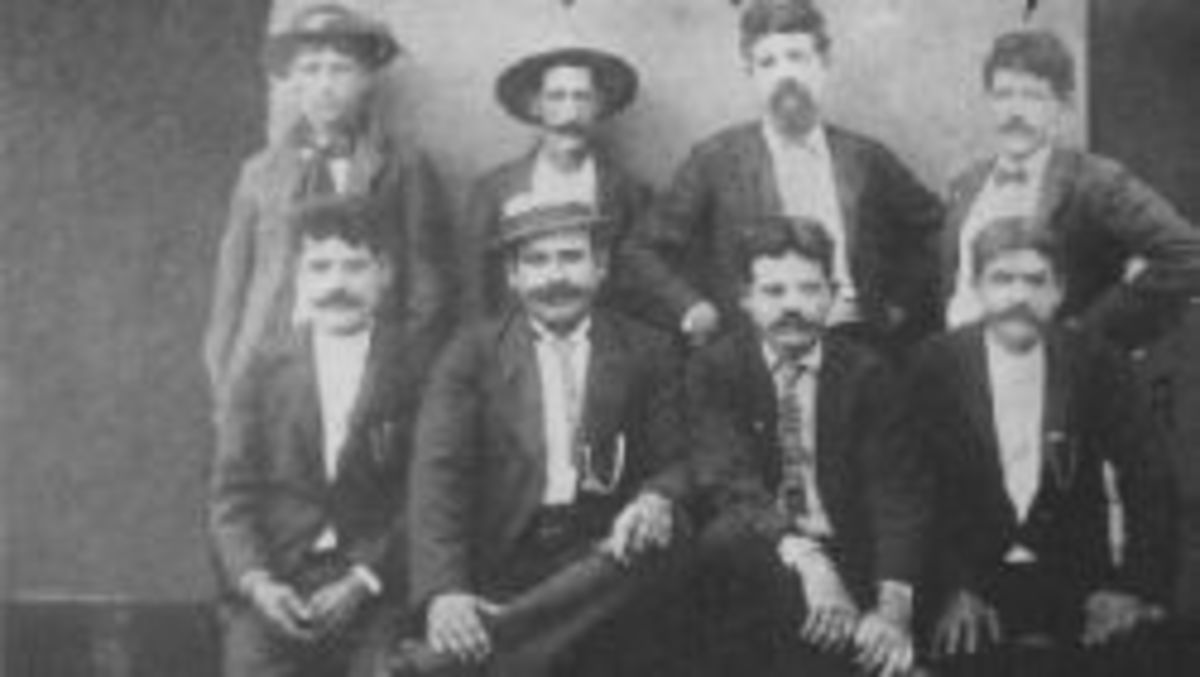 My great grandfather, Theodoro Pacheco (top row on the right), was smuggled from Hawaii