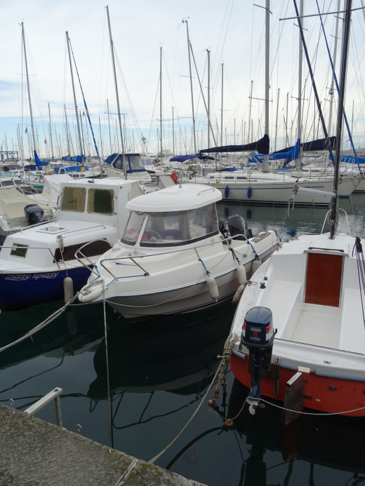 Yachts in the Harbor at Trieste which has a busy port with many ferries to neighboring towns in Italy and across the border