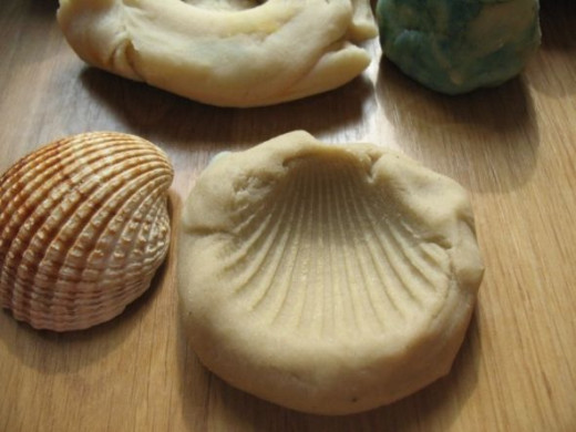 Homemade Playdough with shell impression