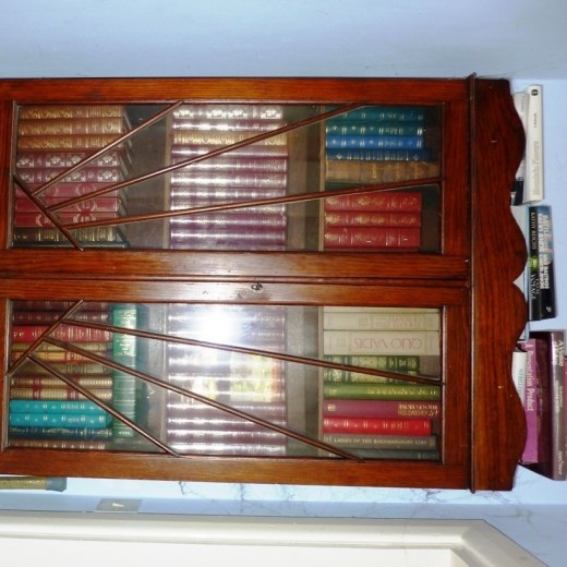 Some of my nicer books in their display cabinet