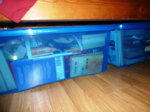 A king size bed allows for many storage boxes full....