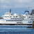 British Columbia ferry "Queen of Coquitlam" drarfs the outrigger (OC6) crew rounding Newcastle Island on their way into the inner harbour. British Columbia ferry "Queen of Coquitlam" drarfs the outrigger (OC6) crew rounding Newcastle Island on their way into the inner harbour.