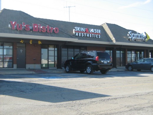 Strip Mall along Route 59 at the west edge of Naperville - many line the highway on both sides with booming housing developments nearby