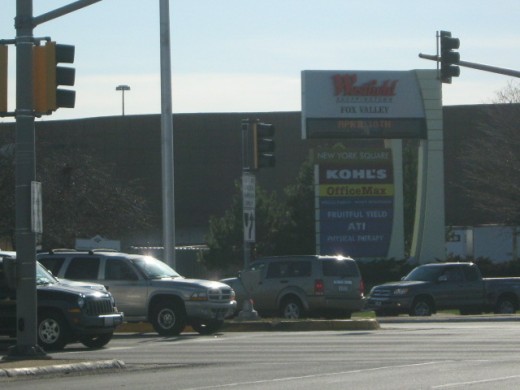 Busy intersection of New York Avenue and Route 59 where Westfield Mall is located amongst many other businesses