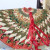Front of tree skirt with red ribbon Front of tree skirt with red ribbon