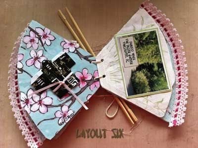Page layout, open. Left side has origami kimono made from Asian paper and trimmed with pink ribbon. Left side has stamped image of bamboo, with photograph of Bamboo Walk taken in Vancouver's Van Dusen Gardens.