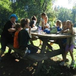 Vegan families enjoying a picnic together