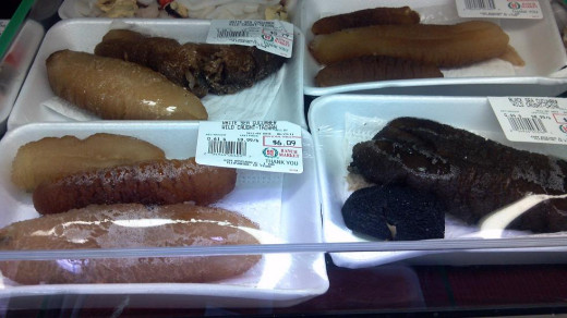 White and Black Wild Caught Sea Cucumbers on Sale at an Asian Food Supermarket