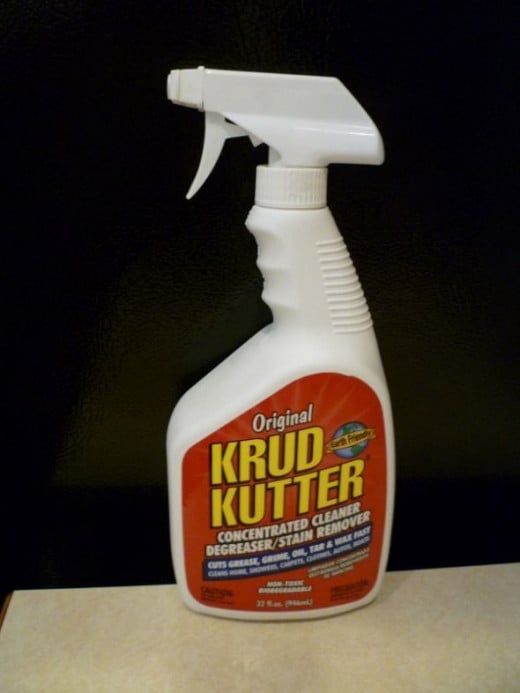 Just before you put the toilet back on, give the tiles a thorough going over with Krud Kutter, a heavy-duty cleaner, to remove any remaining grout haze on the tiles.  Be careful not to get any Krud Kutter in the grout lines.  According to my husband,