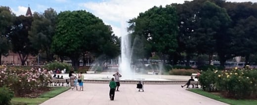 The fountain in the center of the Rose Garden. Even boys have fun there.