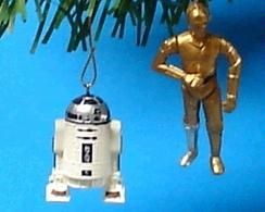 R2D2 &amp; 3CPO Are The Droids From Star Wars.  The image is from Amazon and the droid ornaments are sold here.