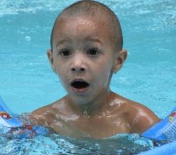 Surprised Kid in Pool