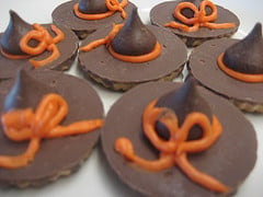 You can make an easy version of witch hat cookies by using the back side of store-bought fudge-striped cookies.
