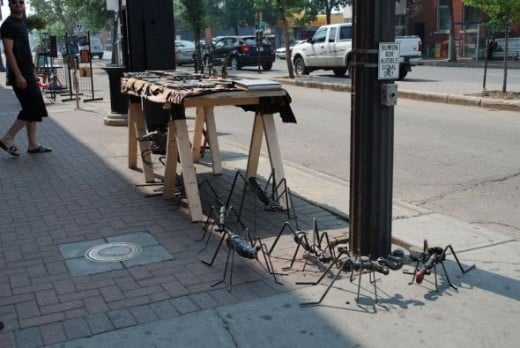 Metal insects at a Whyte Ave intersection