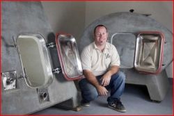 Micah Utter with Concrete Fermentation Tanks