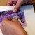 I insert the tab into the slit I cut in the photo above Coopy's head. I insert the tab into the slit I cut in the photo above Coopy's head.