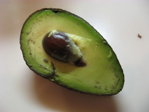 I press on the avocado skin. If it has a little "give" to it, then it is ripe.